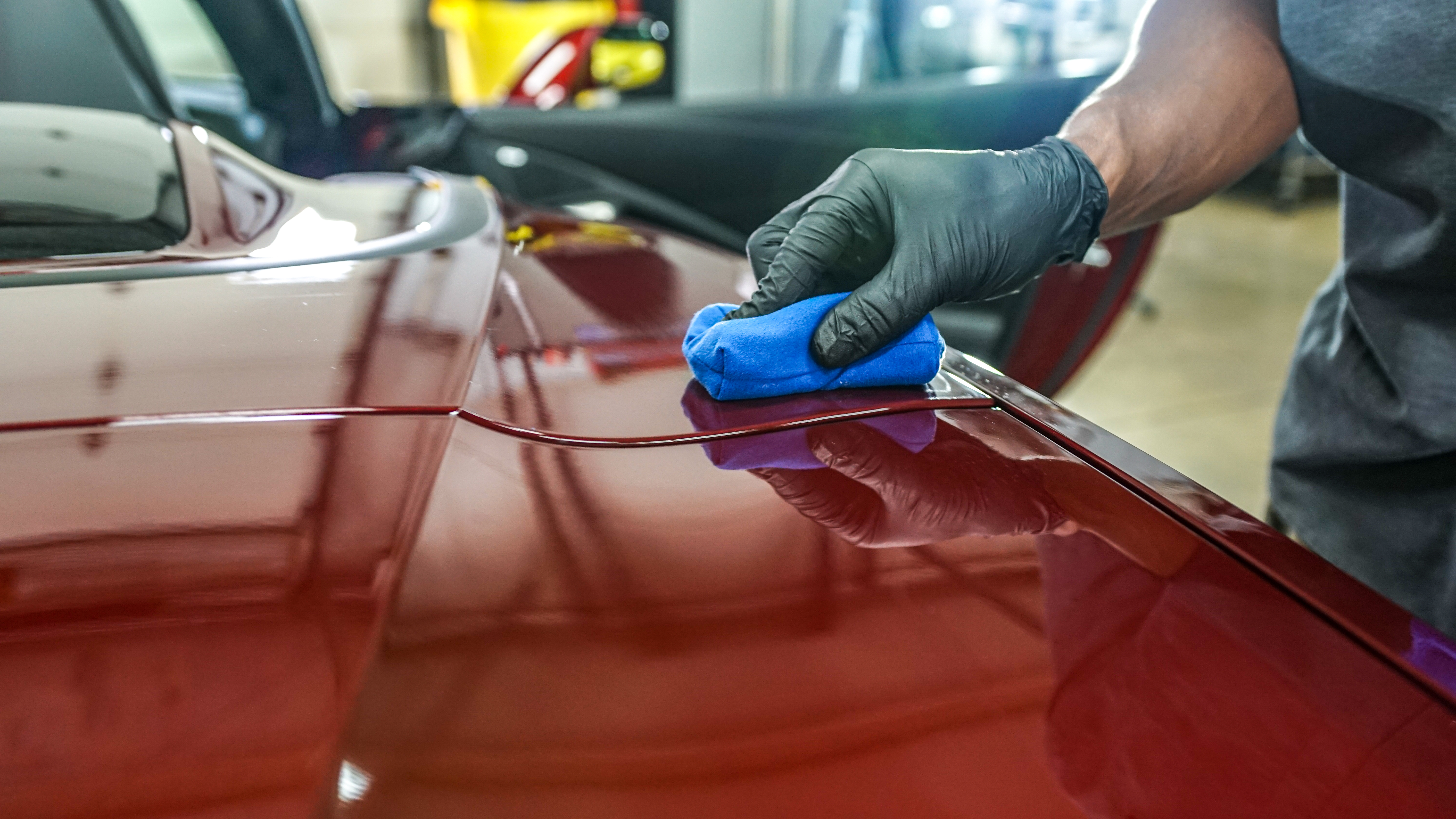 Mirror finish on red Corvette after ceramic coating
