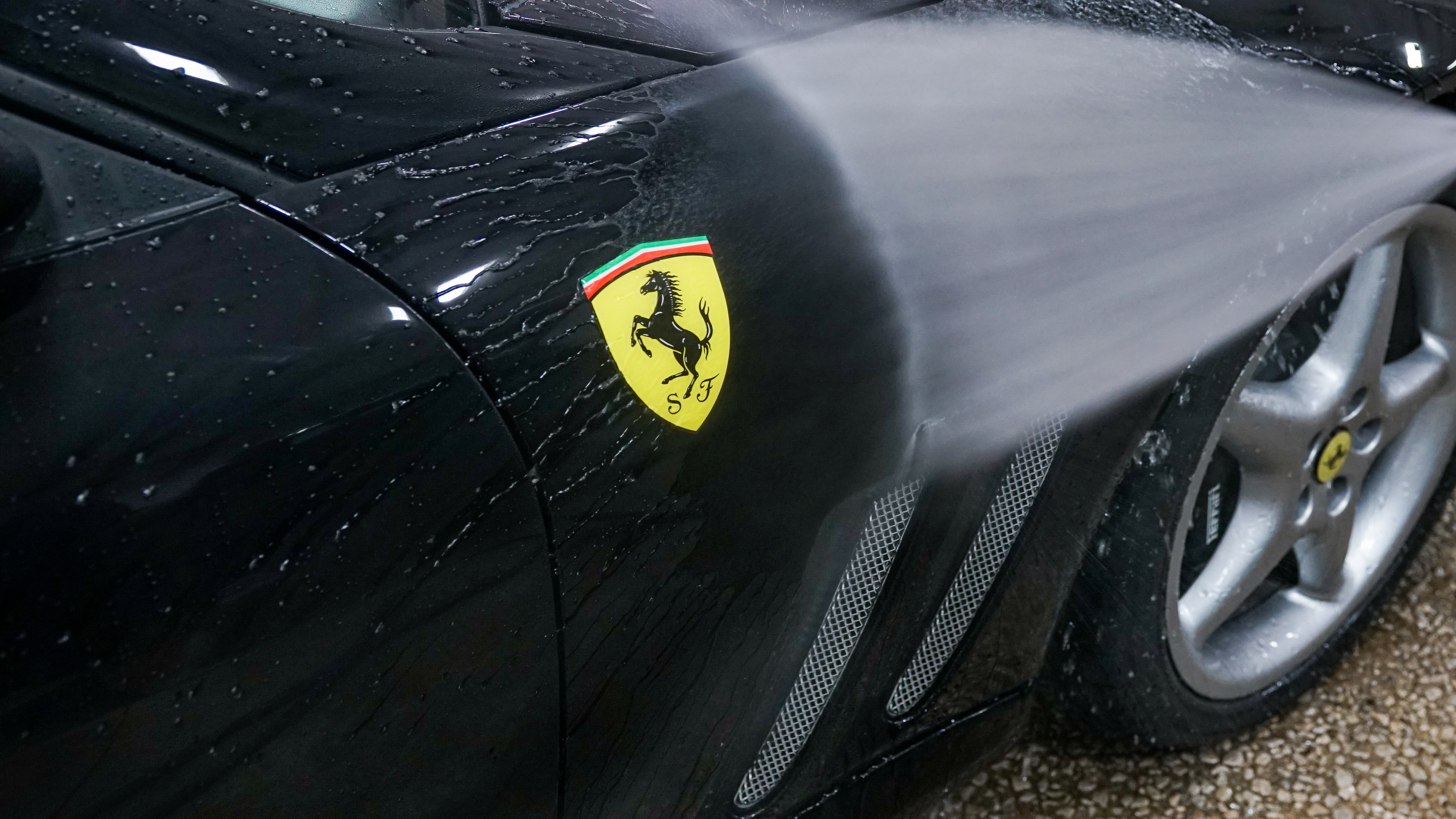 Ferrari front being hand washed with foam
