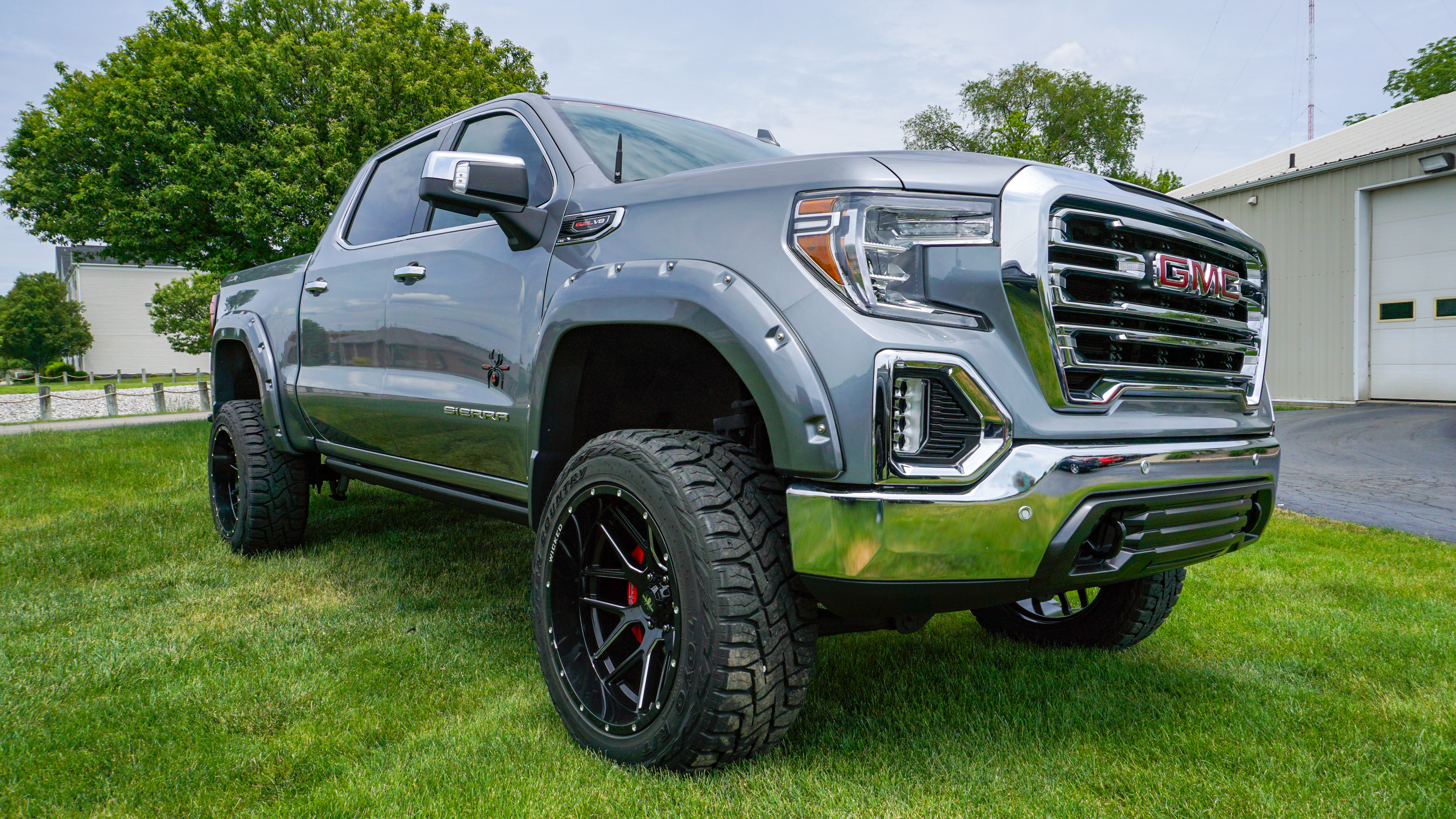 Finished lifted GMC Sierra truck looking showroom fresh