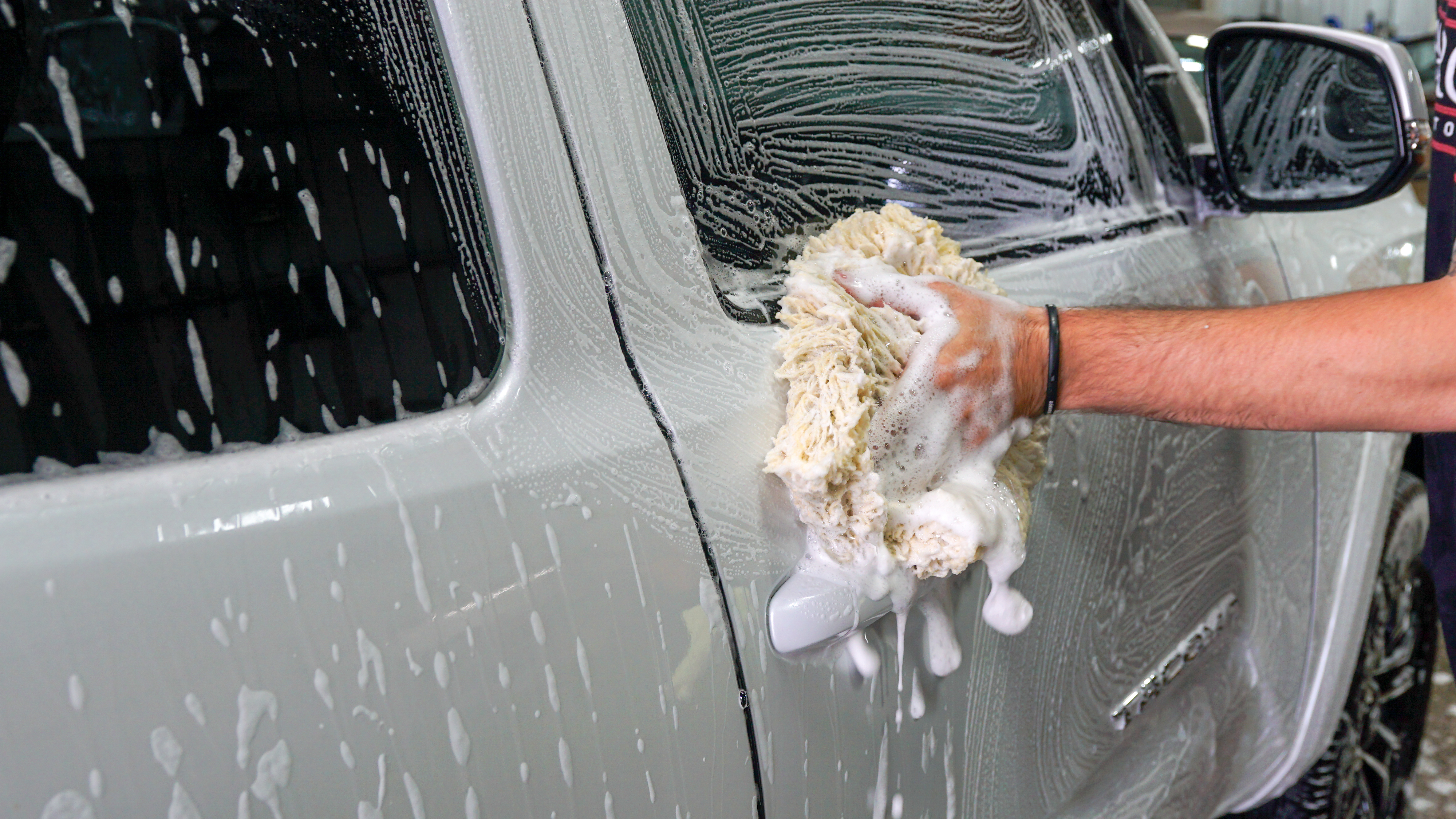 Toyota Tacoma being pressure washed